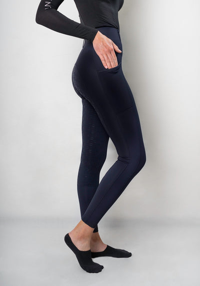 Riding leggings with cell phone pocket