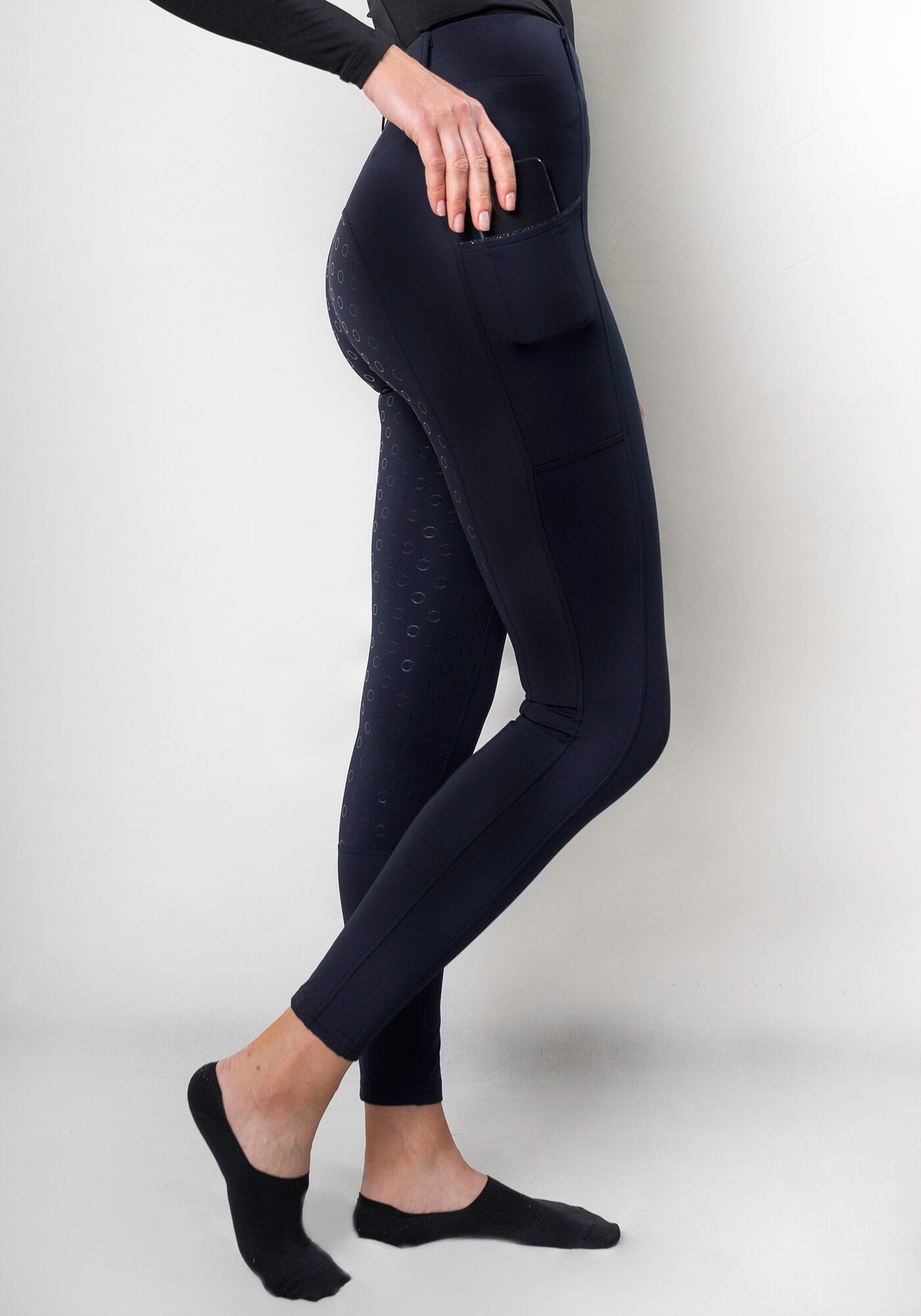 Riding leggings with cell phone pocket